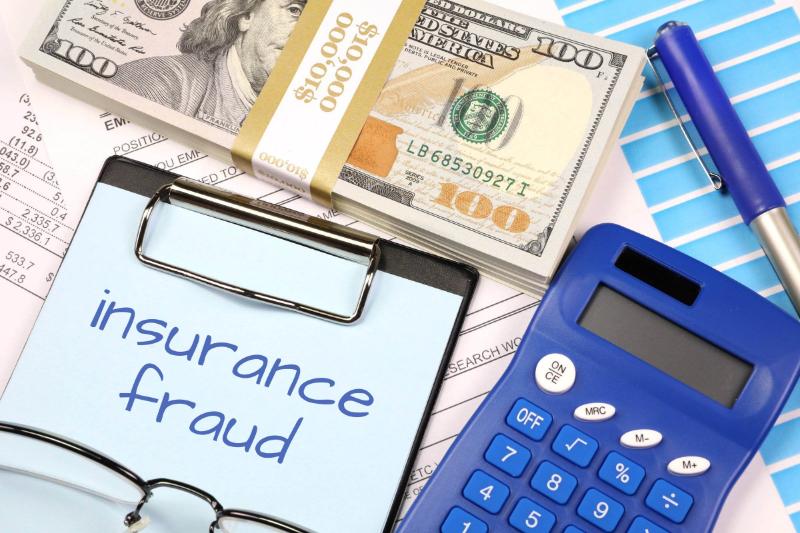 insurance fraud with calculator